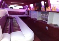 rented a limousine from the inside day, you can see glasses, TV, leather seats hemmed